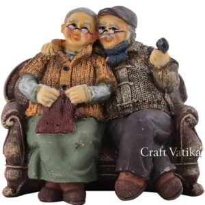 CraftVatika Dada Dadi Romantic Couple Miniatures Grand Parents on Sofa Statue Showpiece for Home Decor - Best Gift for Love, Valentine, Retirement Party, Wedding Anniversary, Multicolor (2242)