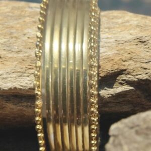 shining diya  plated hinged cuff bracelet