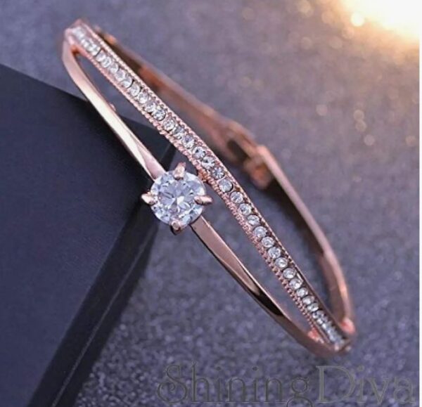 Shining Diva Fashion Stylish 18k Rose Gold Plated Crystal Bangle Bracelet for Women-(9814b)
(10695) SHANI
