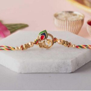 eCraftIndia Golden Peacock Colorful Feathers Designer Rakhi with Roli Chawal Pack - Rakhi for Brother, Bhaiya, Bhai
Rajender 05