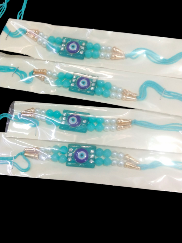 PrezzieBush, Pack of 4 Designer Rakhi for Brother, Studded with Pearls & Diamond, with Roli + Kumkum for BROTHER
SET OF 4 
RAJENDER 024