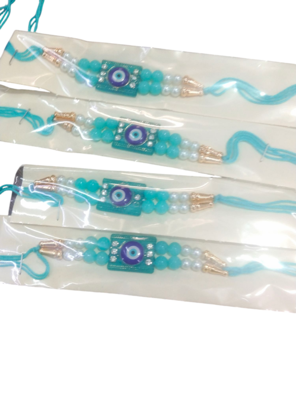 PrezzieBush, Pack of 4 Designer Rakhi for Brother, Studded with Pearls & Diamond, with Roli + Kumkum for BROTHER
SET OF 4 
RAJENDER 024 - Image 2